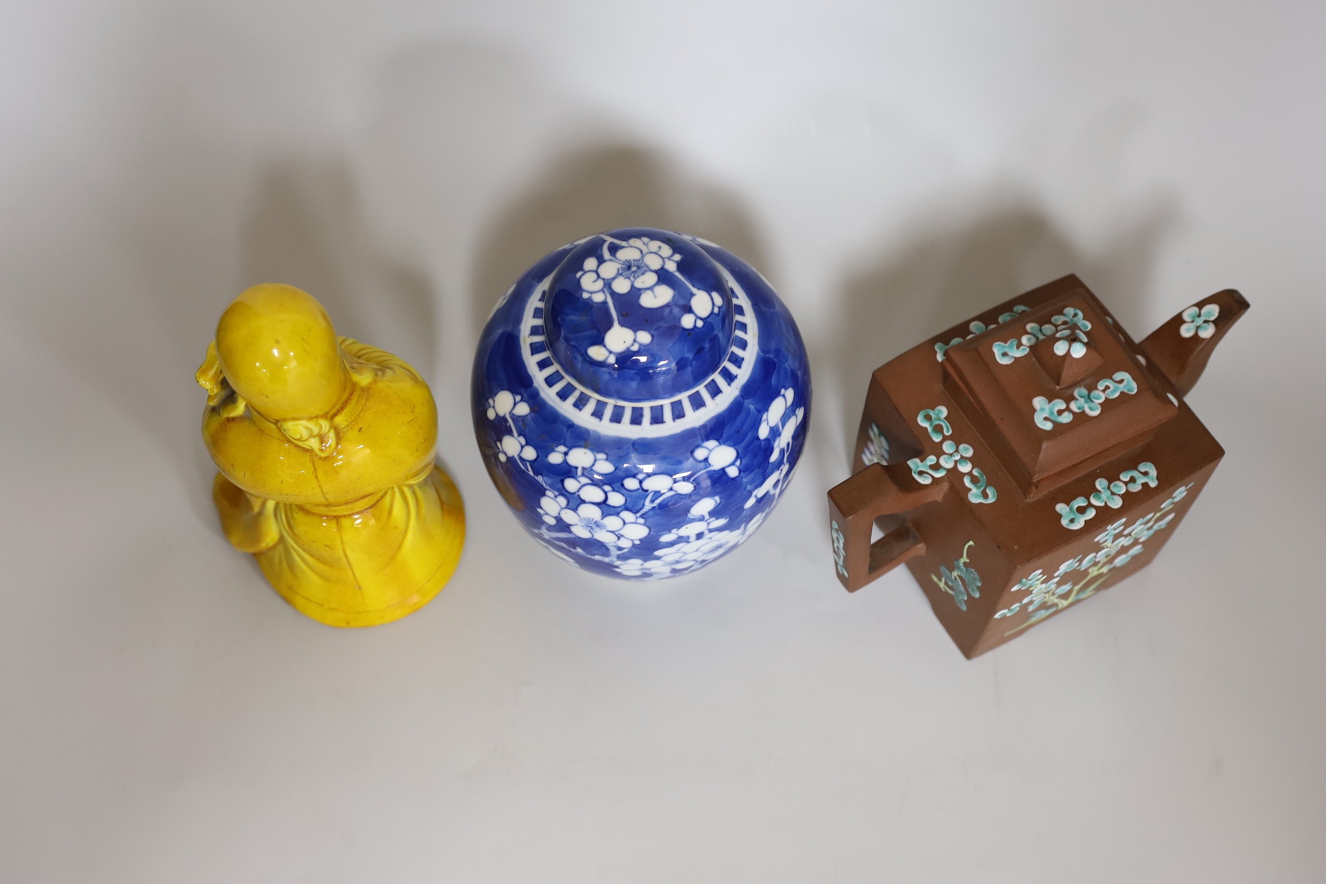 A Chinese prunus ginger jar, an enamelled Yixing teapot and a Japanese monochrome figure of Fukurokuji, tallest 18cm